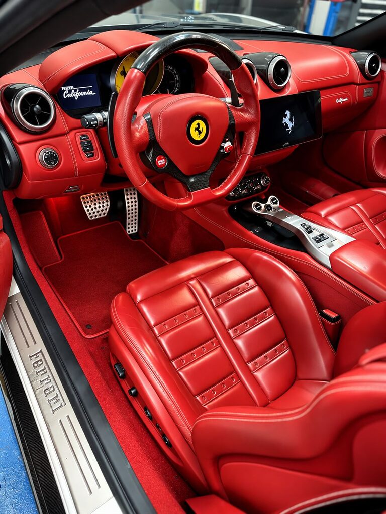 Ferrari Repair & Service Dubai 53 Red leather interior of a Ferrari California at Rise Tech Auto in Dubai