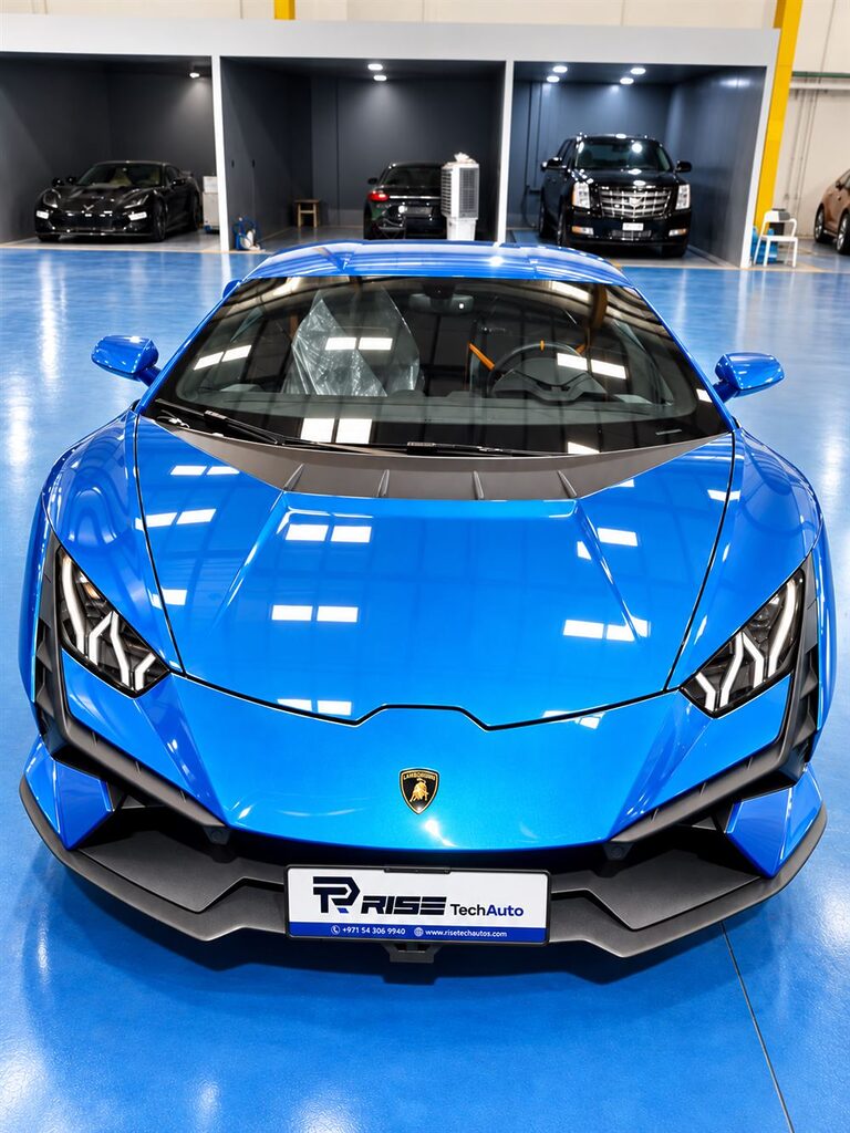 Lamborghini Repair & Service Dubai 48 Front view of a blue Lamborghini Huracan in the Rise Tech Auto workshop in Dubai