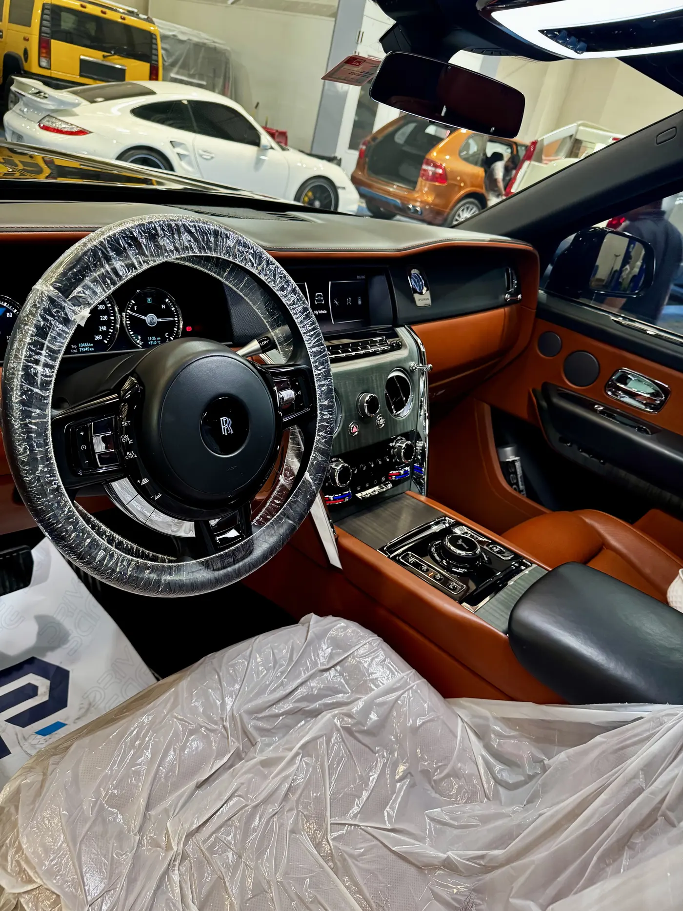 Rolls-Royce Cullinan interior with protective covers in Dubai